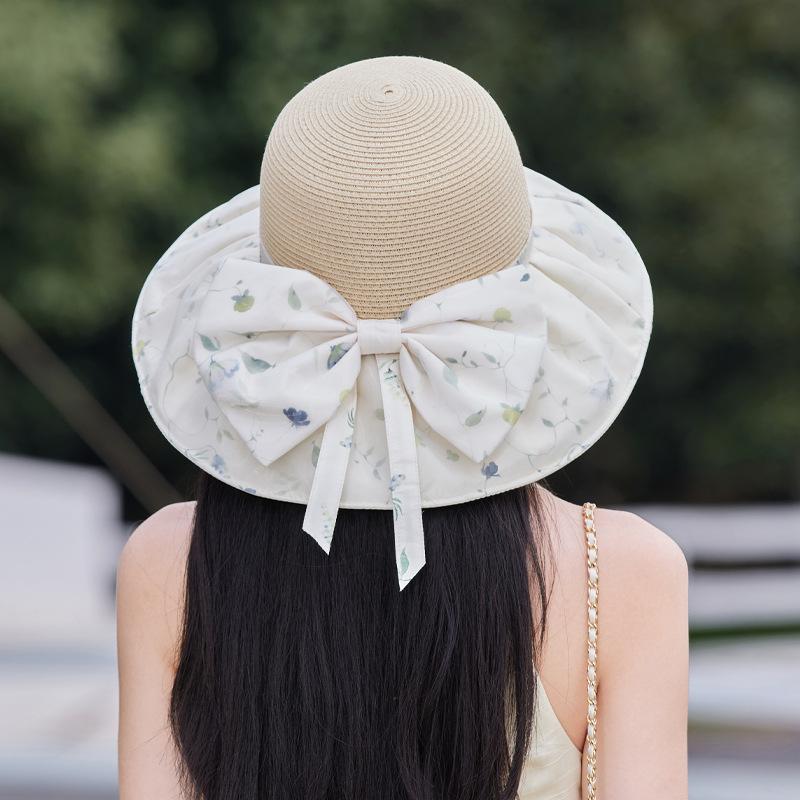 Taizhou Wenling summer hat women's printed grass top breathable bucket hat big brim shows small face high-end sun protection hat