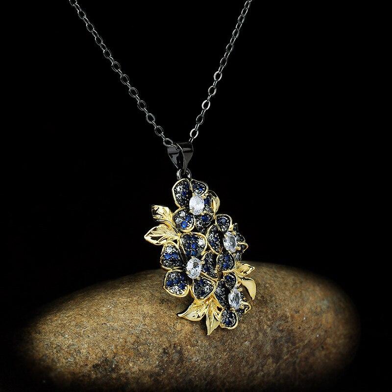 Изысканное женское ожерелье с синим цирконом, инкрустированная подвеска в форме цветка, цепочка на ключицы, вечерняя женская цепочка для свитера, ювелирные изделия из черного золота