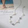 ORSA JEWELS Серебряный браслет на щиколотку 925 пробы с белой ракушкой Дизайн с четырехлистником Стиль природы Счастливый символ Летний аксессуар Подарок GMA03
