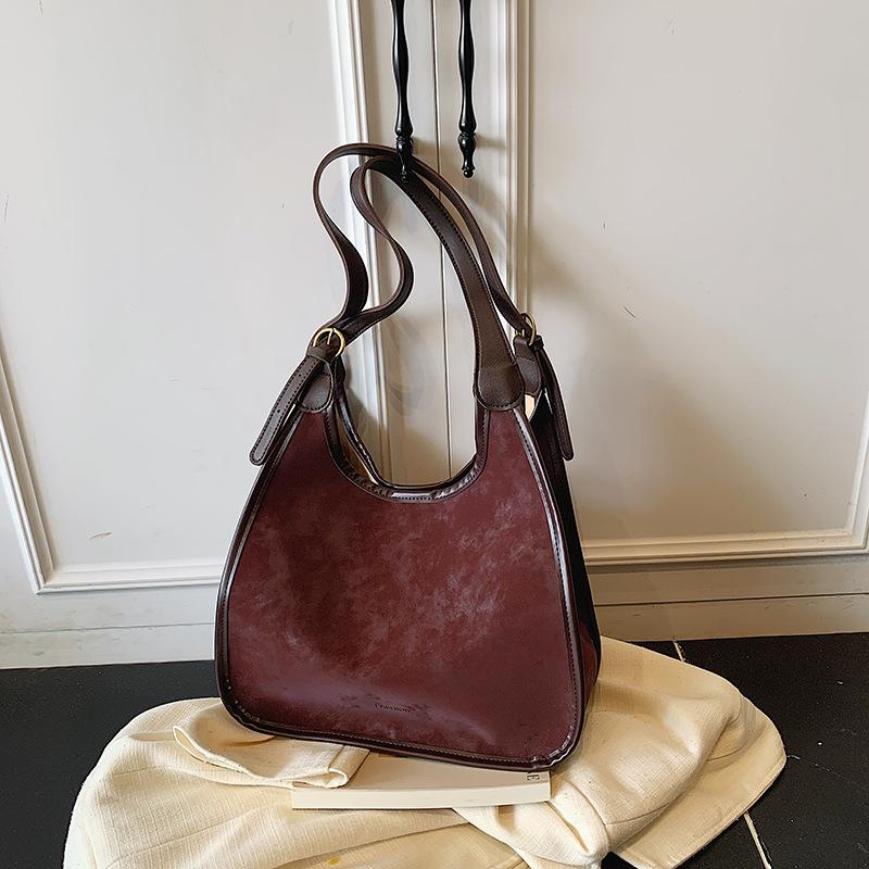 Изысканная Универсальная Кожаная Сумка на Одно Плечо Портативная Большая Вместимость Модная Темпераментная Иностранная Премиальная 2025 Осенняя Женская Сумка-Тоут