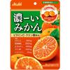 Asahi Dark mikan 84g Конфеты с темным вкусом, приготовленные из сока мандаринов Онсю.Темные Конфеты с темным вкусом, приготовленные из сока мандаринов Онсю
