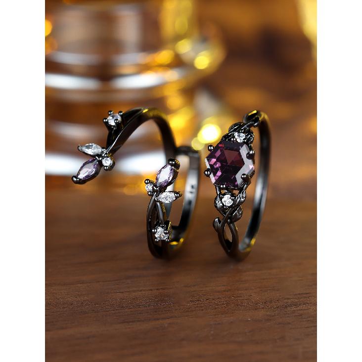 Vintage black and gold hexagonal ring with purple diamonds Forest-inspired branch and leaf design, a touch of understated luxury