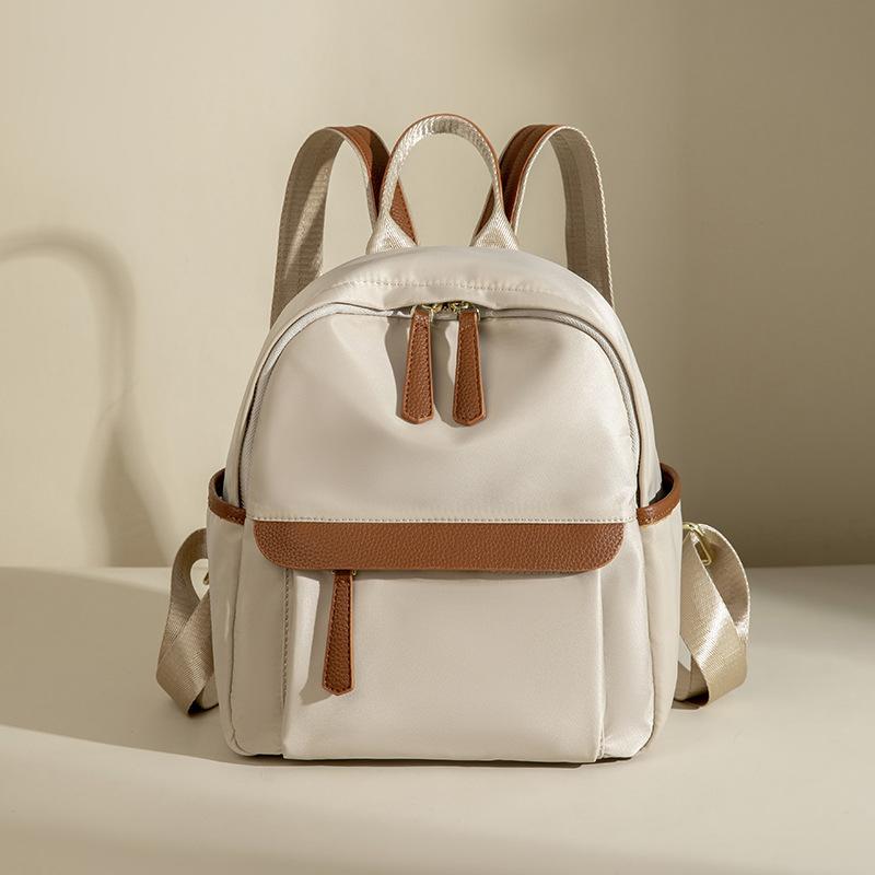 Новый рюкзак большой вместимости из высококачественной легкой ткани Оксфорд, модный и стильный, водонепроницаемый, для путешествий, школы