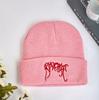 Pullover men and women knitted ngeR embroidery flower cold hat band popular wool European and American eve black and white black and red