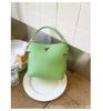 2025 Spring and Summer New Korean Bucket Bag Niche Casual One-shoulder Crossbody Hand-held Commuter High-end Women's Bag