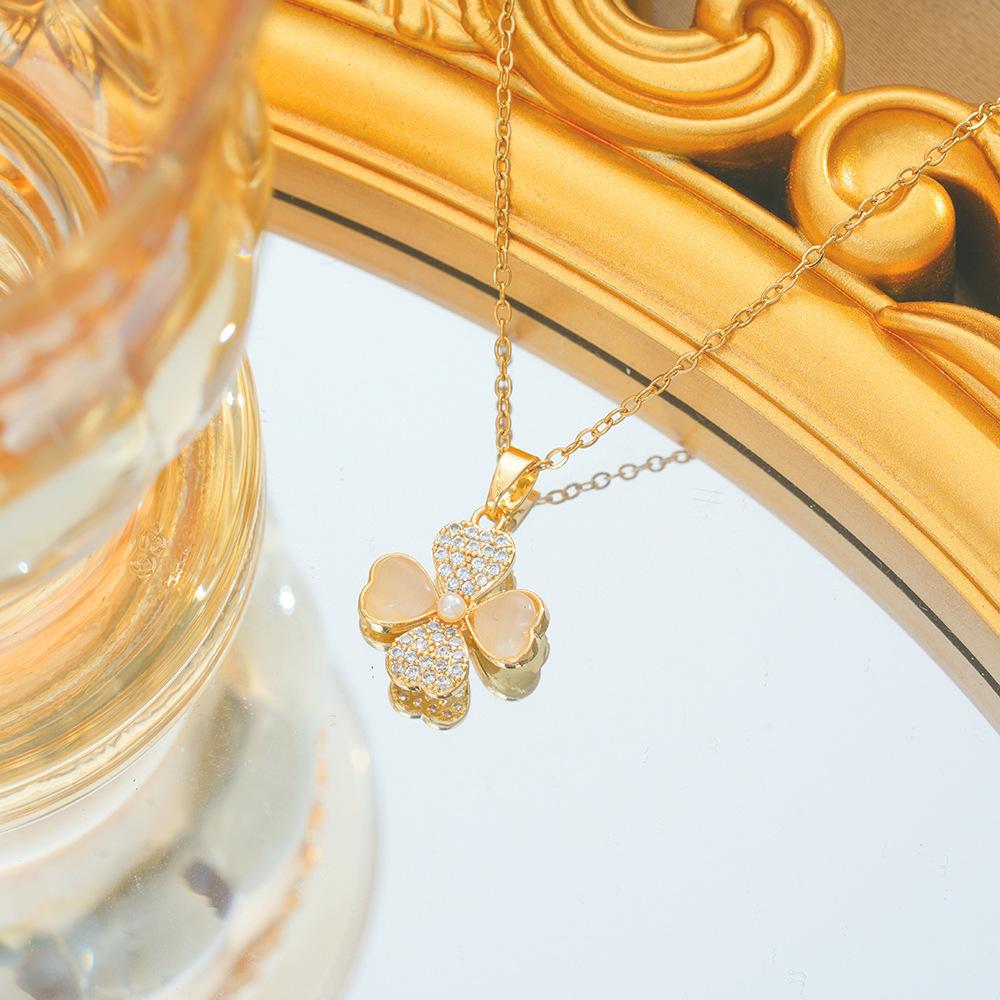 Ожерелье с четырьмя листьями и цветком для женщин, модная цепочка на ключицу, новый свет, роскошный нишевый универсальный камень кошачий глаз