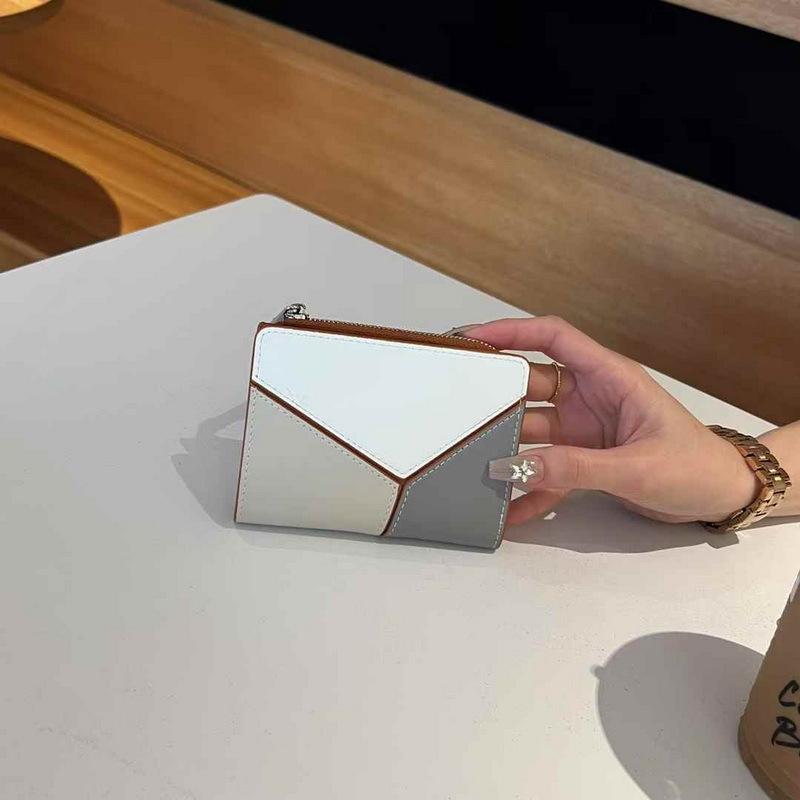 2025 New Genuine Leather Wallet Head Layer Leather Women's Handbag Short Style Simple Color Contrasting Geometric Splicing Women's Wallet