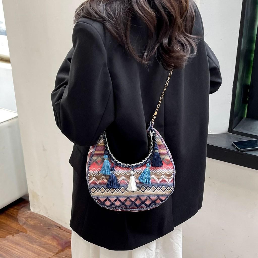 Trendy Crescent Satchel With Tassels And Chain For Streetwear Fashion