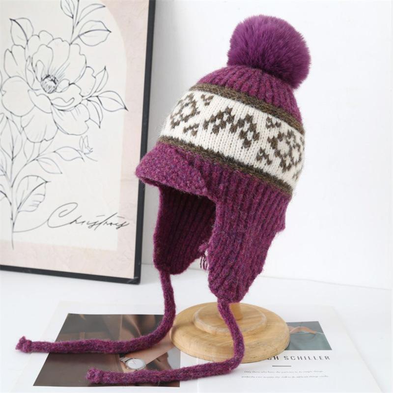 Autumn and winter warm knitted hat women's travel versatile bag head hat cold protection ear straps wool Lei Feng hat