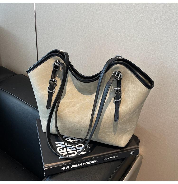 Вместительная сумка подмышку женская новая модная ретро сумка через плечо нишевая универсальная сумка-тоут для通勤