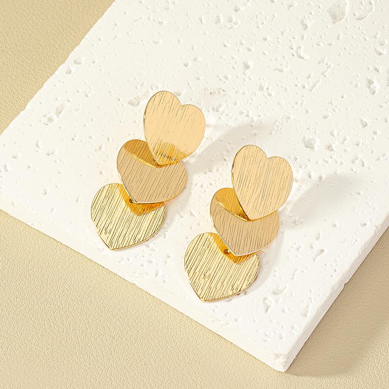 Exaggerated Punk Heart Earrings: European & American Style for Women