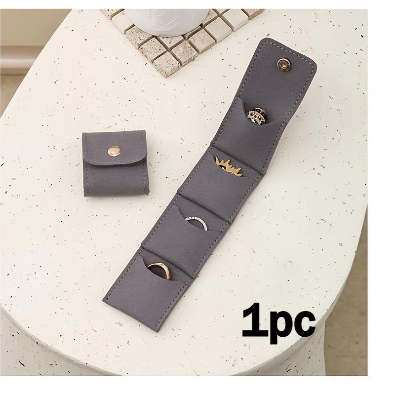 Foldable Genuine Leather Travel Jewelry Roll-a Portable Jewelry Storage Box with Multiple Compartments Featuring a Buckle Design