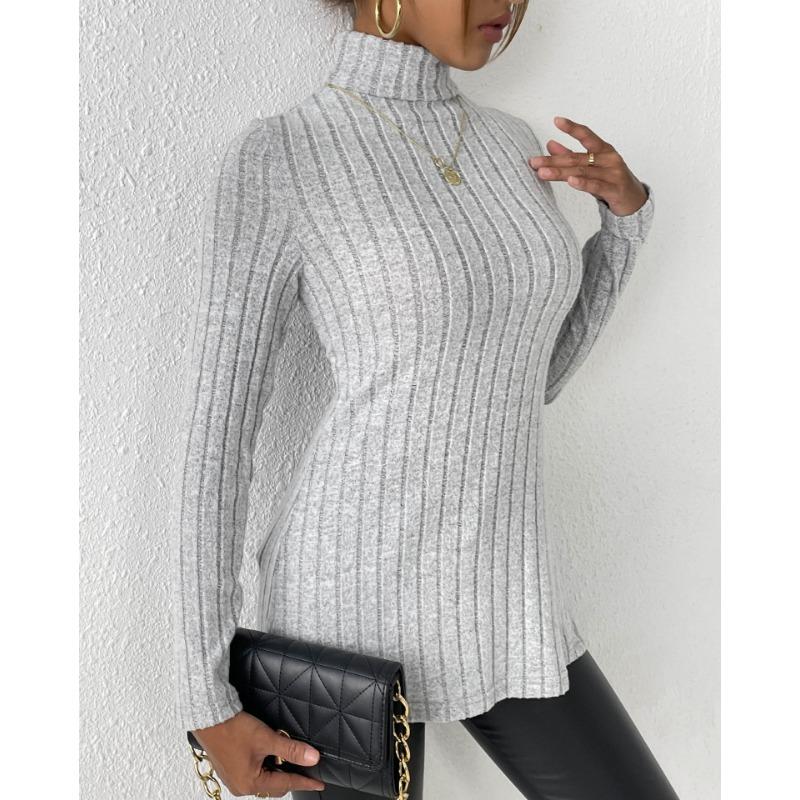 Женский свитер средней длины с высоким воротом и разрезом, осень/зима