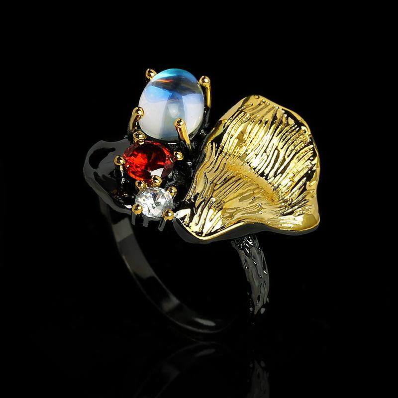 Fashion Moonstone Ring New Black Gold Jewelry with Red Zircon Jewelry