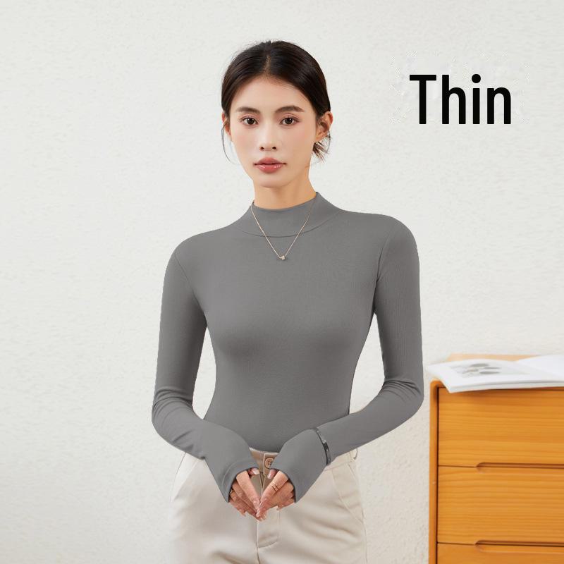 Женская облегающая рубашка с длинным рукавом и полуводолазкой — незаменимый предмет гардероба на осень/зиму в черном или белом цвете