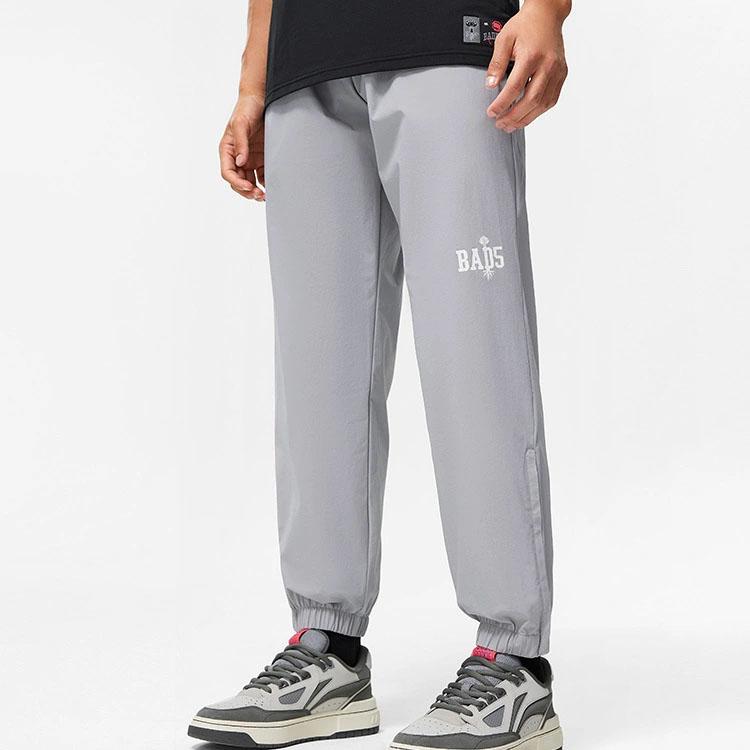 Li-Ning Баскетбольная серия Badfive, галстук на щиколотке с буквенным принтом, быстросохнущие крутые вязаные спортивные штаны, мужские штаны, Ultimate-серый цвет, AYKT495-3