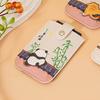 A slim and portable credit card wallet with RFID shielding, multiple card slots, cute panda design, compact and lightweight