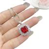 Стильный комплект украшений: открытое кольцо с красным турмалином и серьги с цирконами для женщин