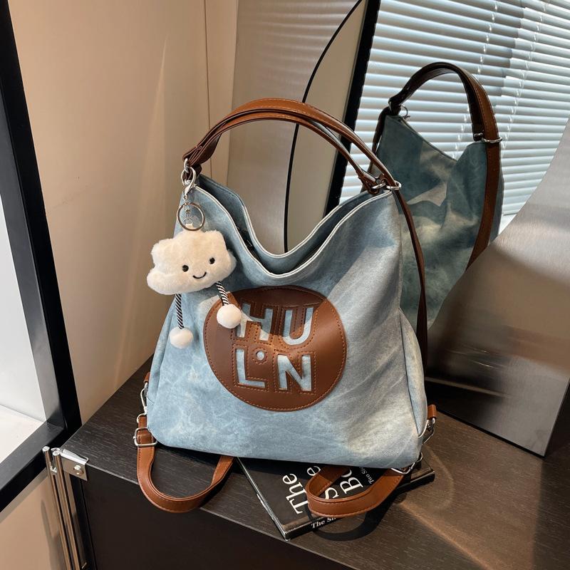 Crossbody bag women's 2025 autumn and winter new fashionable large-capacity backpack student commuting shoulder tote bag