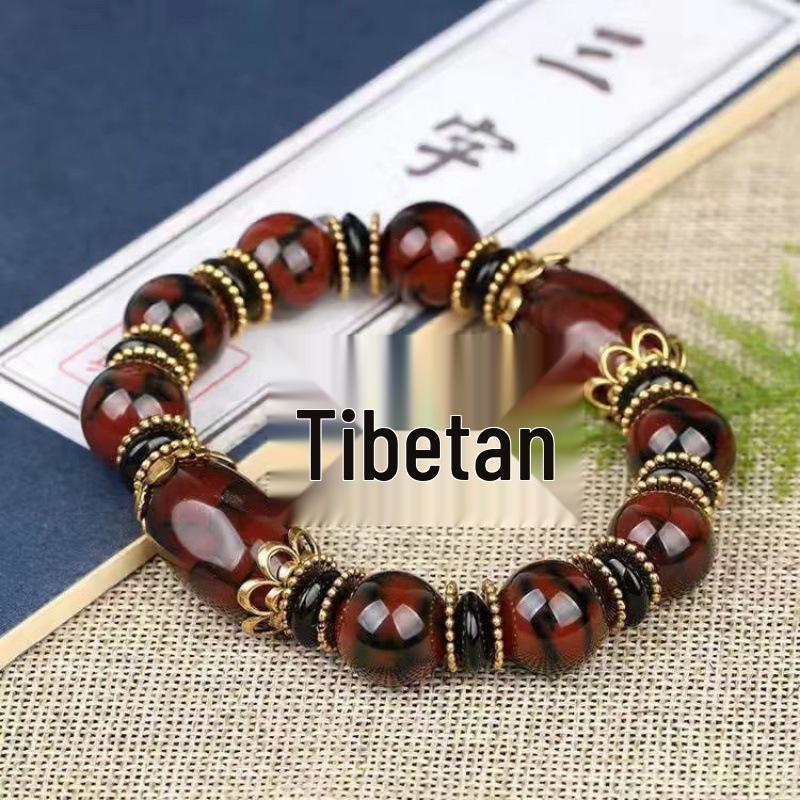 Tibetan Three-Eyed Dzi Beads Unisex Bracelet with Dragon Pattern Ice Flower Agate and Retro Ethnic Style in Red and Yellow.