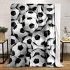 The main pattern is a dense arrangement of black-and-white soccer balls. for all seasons blanket lunch break throw gift