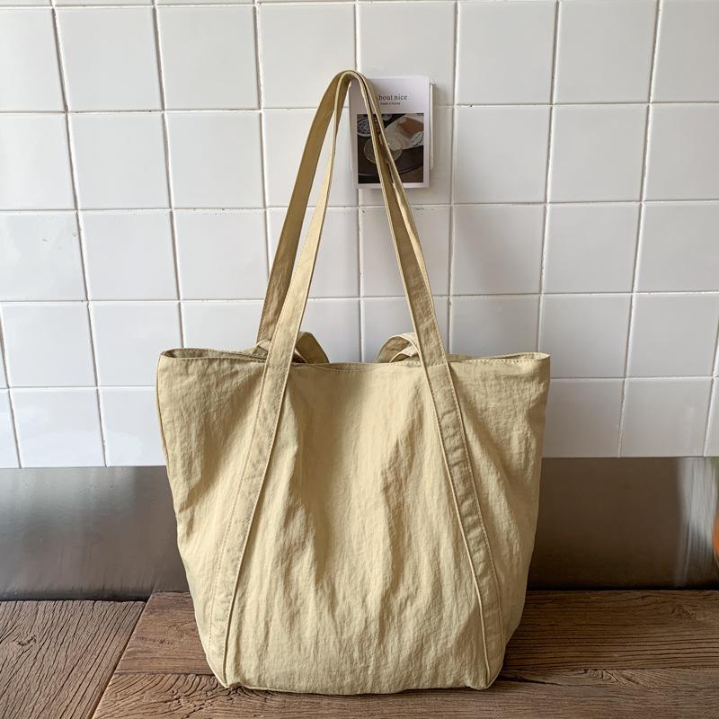 2025 Autumn New Japanese Nylon Shoulder Bag Commuter Large Capacity Handbag Light Shopping Backpack Women