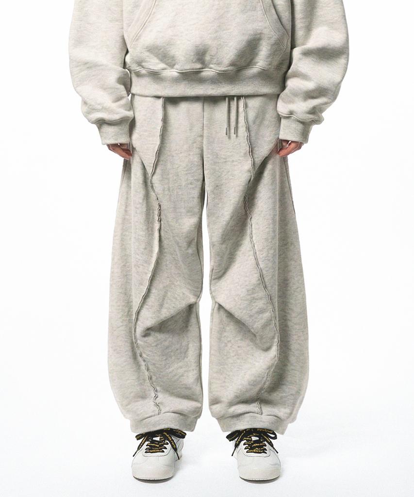 PRINOAR Refined Oblique Curved Sweatpants - Oatmeal