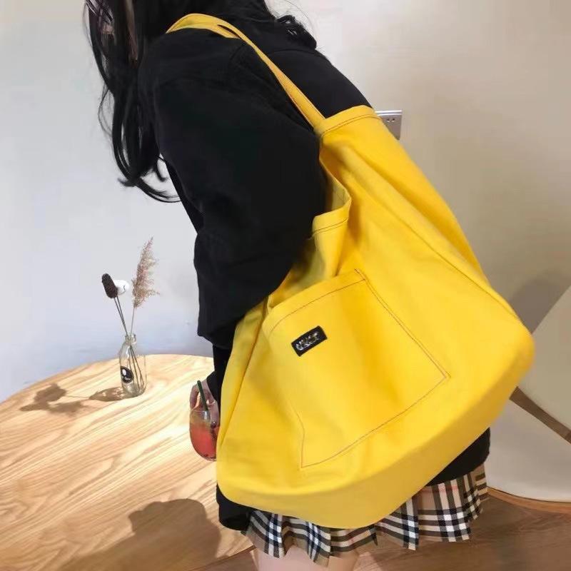 Нишевая однотонная холщовая сумка сумка 2025 новая корейская версия стиль ins сумка через плечо простая повседневная сумка-тоут большой вместимости