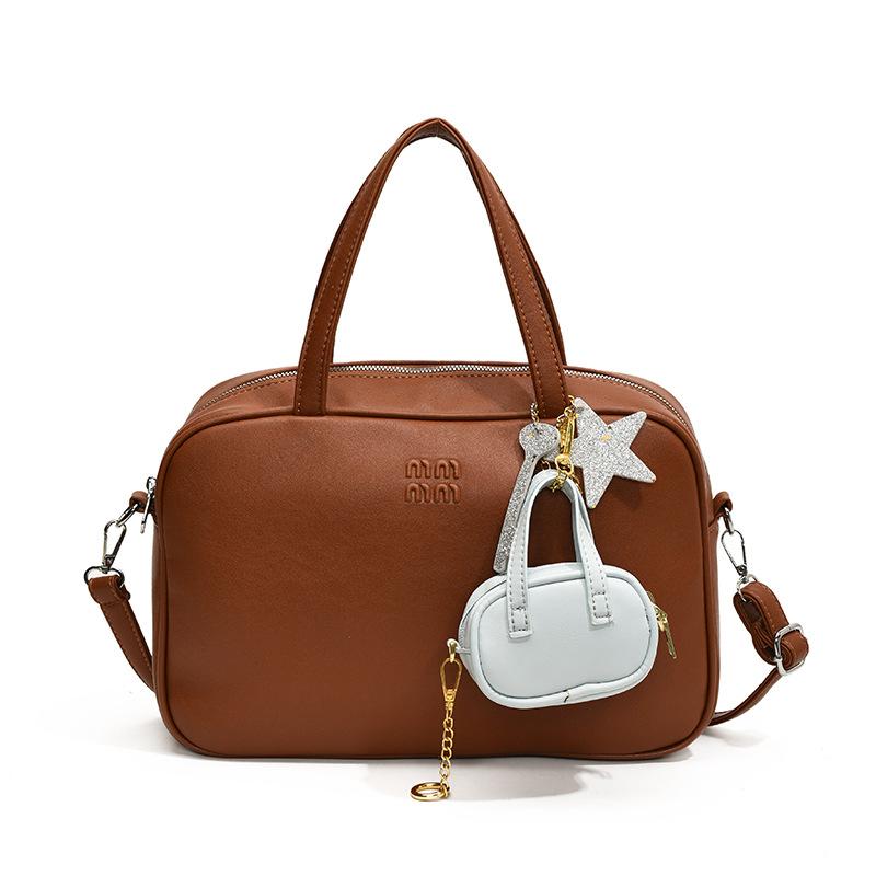 Простая ручная сумка в стиле ретро, портативная сумка для поездок на работу, новая нишевая сумка-подушка высокого класса, вместительная женская сумка