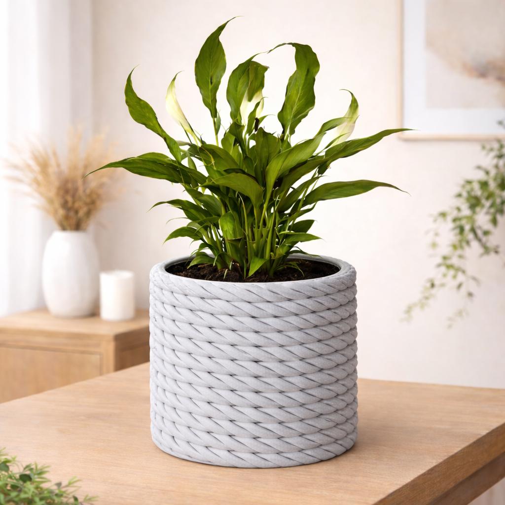 Decorative gray flowerpot with a braided pattern