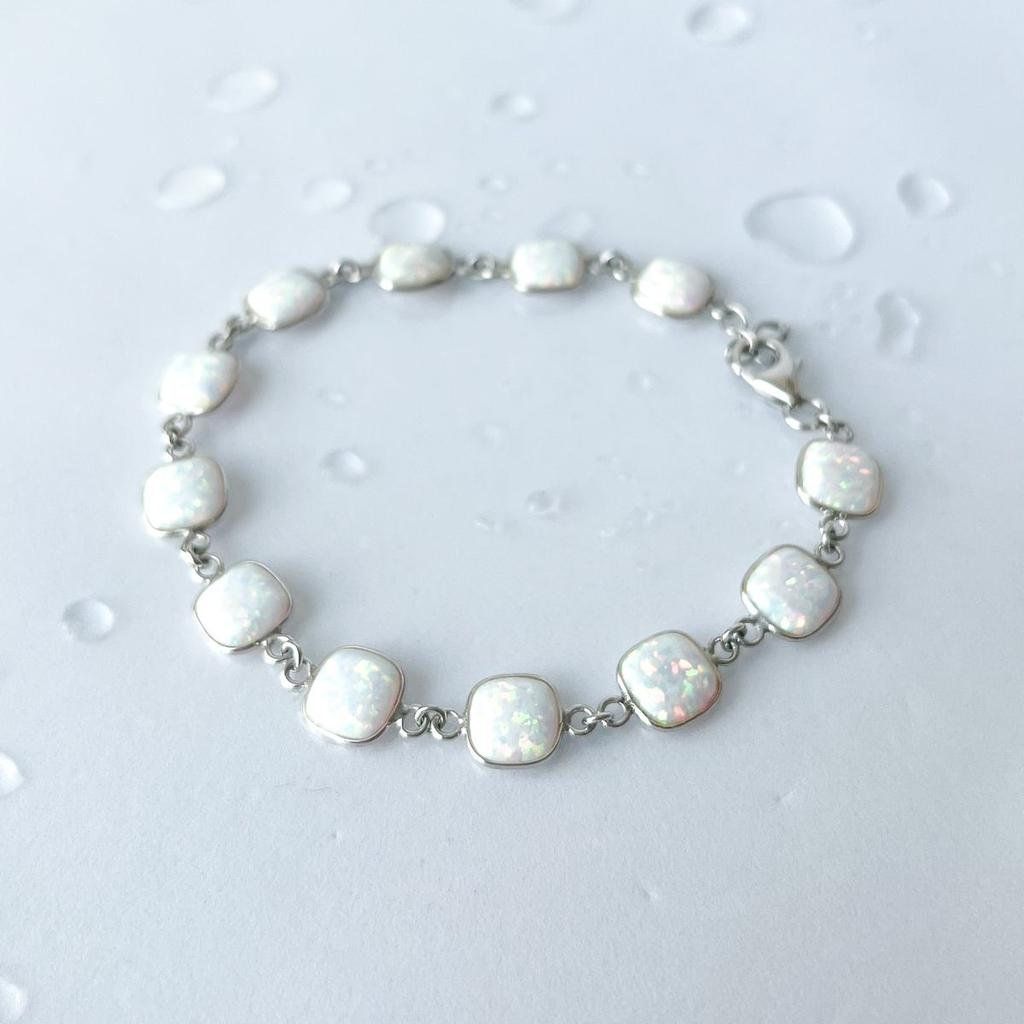 Серебряный браслет с опалом 11.256ct, вес изделия 4,73 гр (2140955)