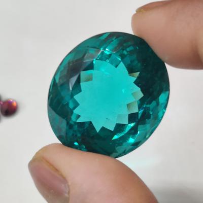 Стеклянный камень цвета Параиба, размер 30x26x20 мм.