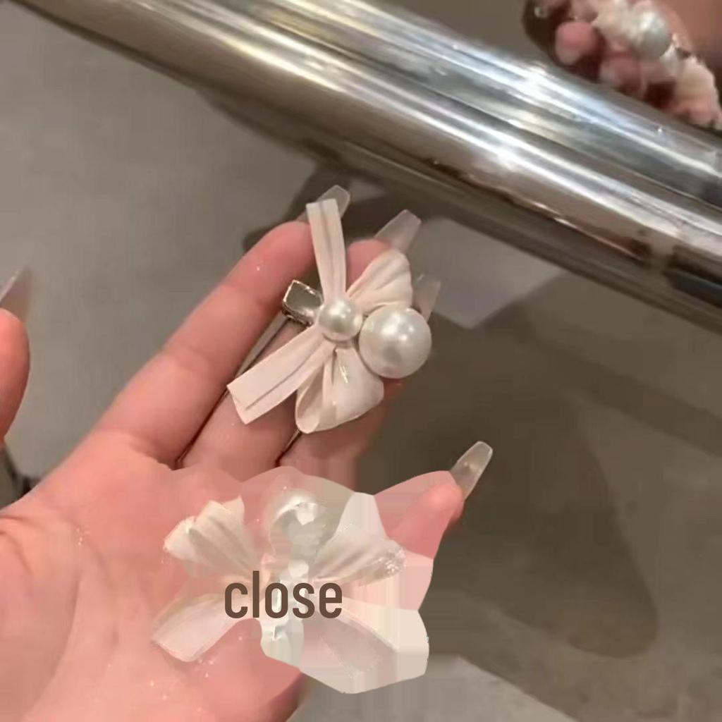Роскошная жемчужная заколка-бантик - элегантный боковой зажим для женщин