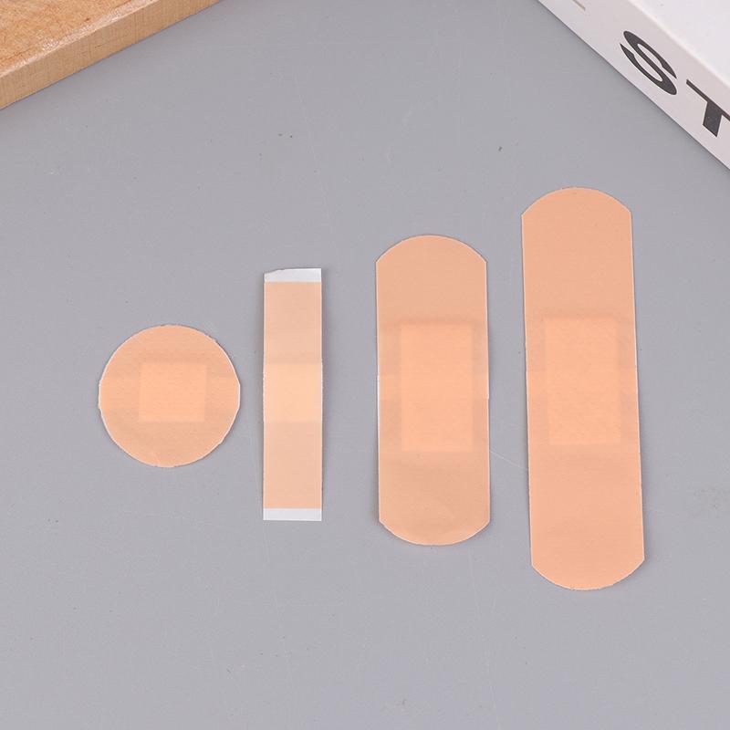 50/100Pcs Waterproof Band-Aids Bandages First Aid Medical Anti-Bacteria Wound Plaster 4 Size Home Travel Emergency Kits
