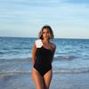 1011 European and American new black and white contrasting colors simple flower decoration slant shoulder one-piece swimsuit women's clothing