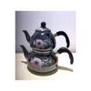 Эмалированный чайник с черными цветами