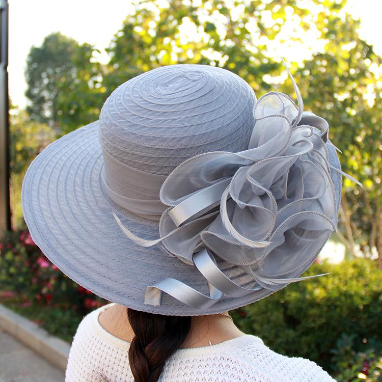 Spring and summer mesh sun hat Eugen yarn flower temperament wedding hat sun protection dome big eaves hat fashion hat women