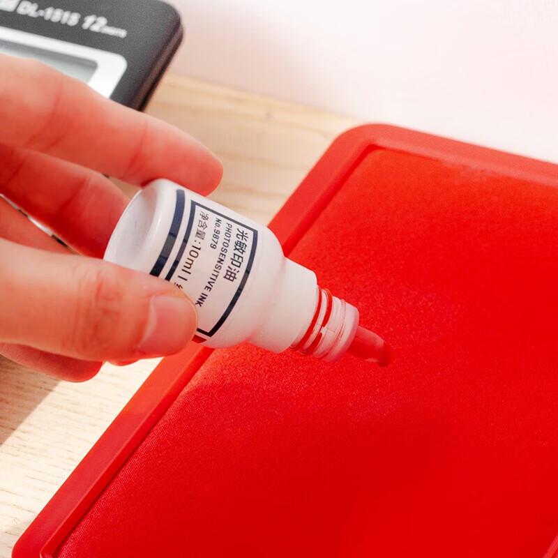 Deli 9879 Red Photosensitive Stamp Ink, 10ml