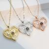 A Simple Heart-Shaped Necklace With A Pendant Featuring The Word "Mom" Projected Onto The Design.