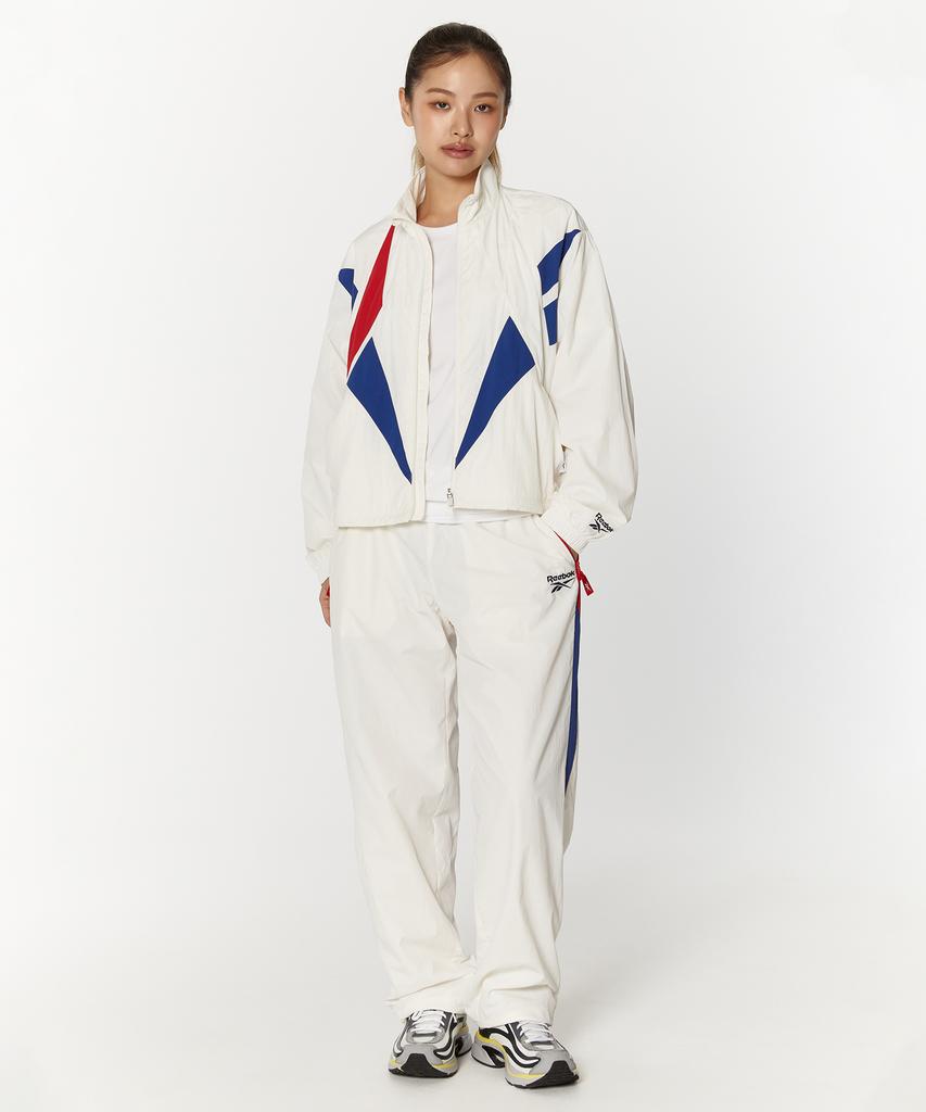 Reebok Теплые брюки Vector Flash 2-Way - Кремовый