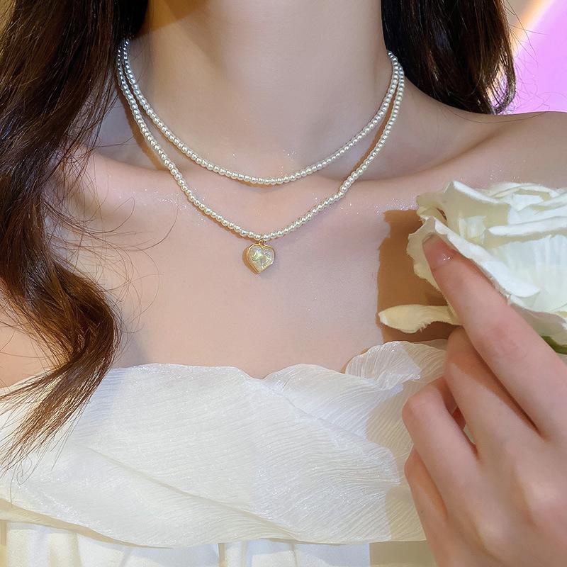 Korean temperament love butterfly pearl fringed necklace fashion collarbone chain versatile item decoration