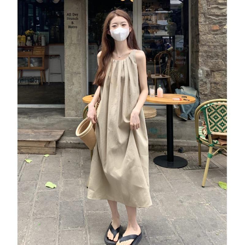 Женское летнее платье без рукавов в корейском стиле белого цвета для похудения