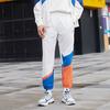 Li Ning Sports Fashion Series Logo Pattern Splicing Design Tapered Knit Pants Autumn Men Bottoms White AKXR421-3