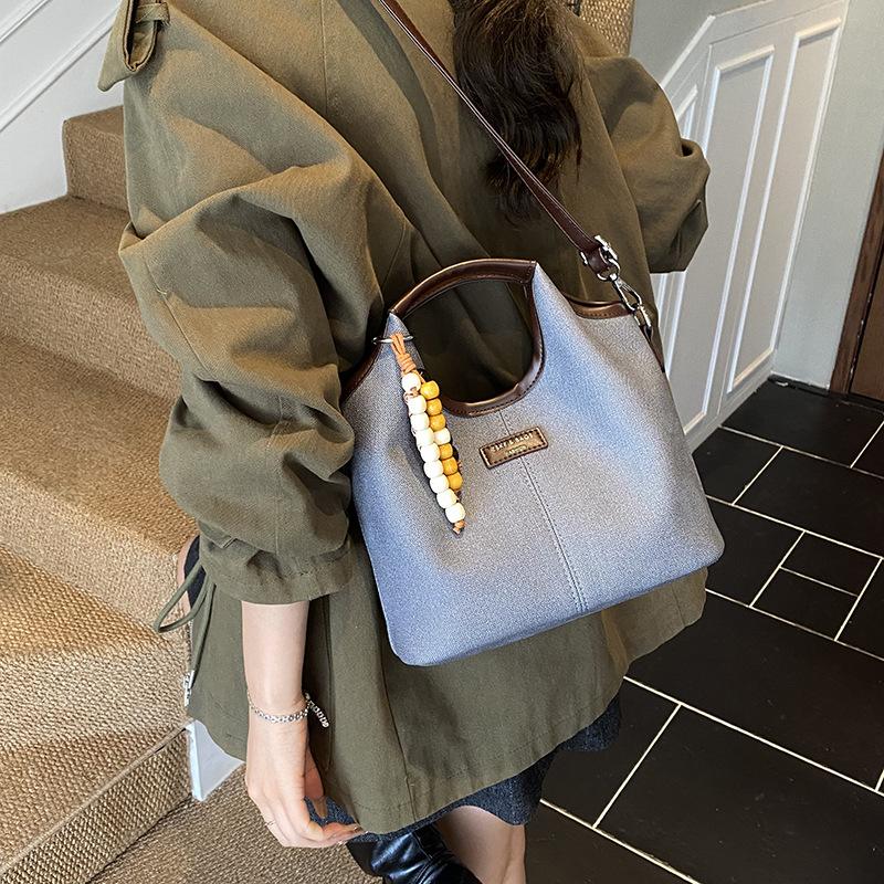 Премиальная женская сумка 2025 новая модная дорожная сумка на плечо, повседневная универсальная сумка-мессенджер, сумка-ведро