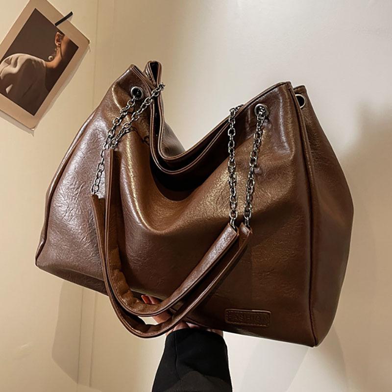 Сумка большой вместимости Женская мода Новая универсальная сумка через плечо для通勤 Тоут