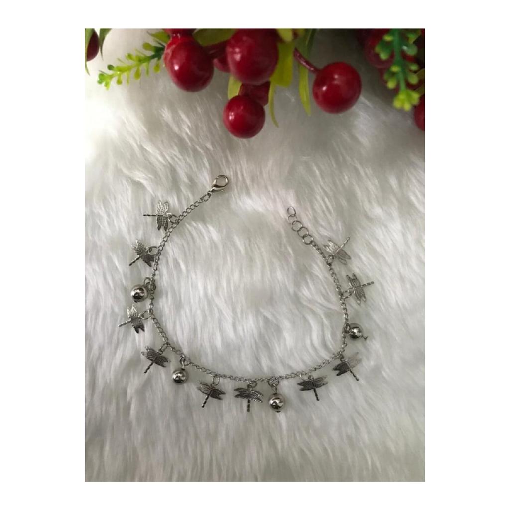 Женский браслет серого цвета со звездой