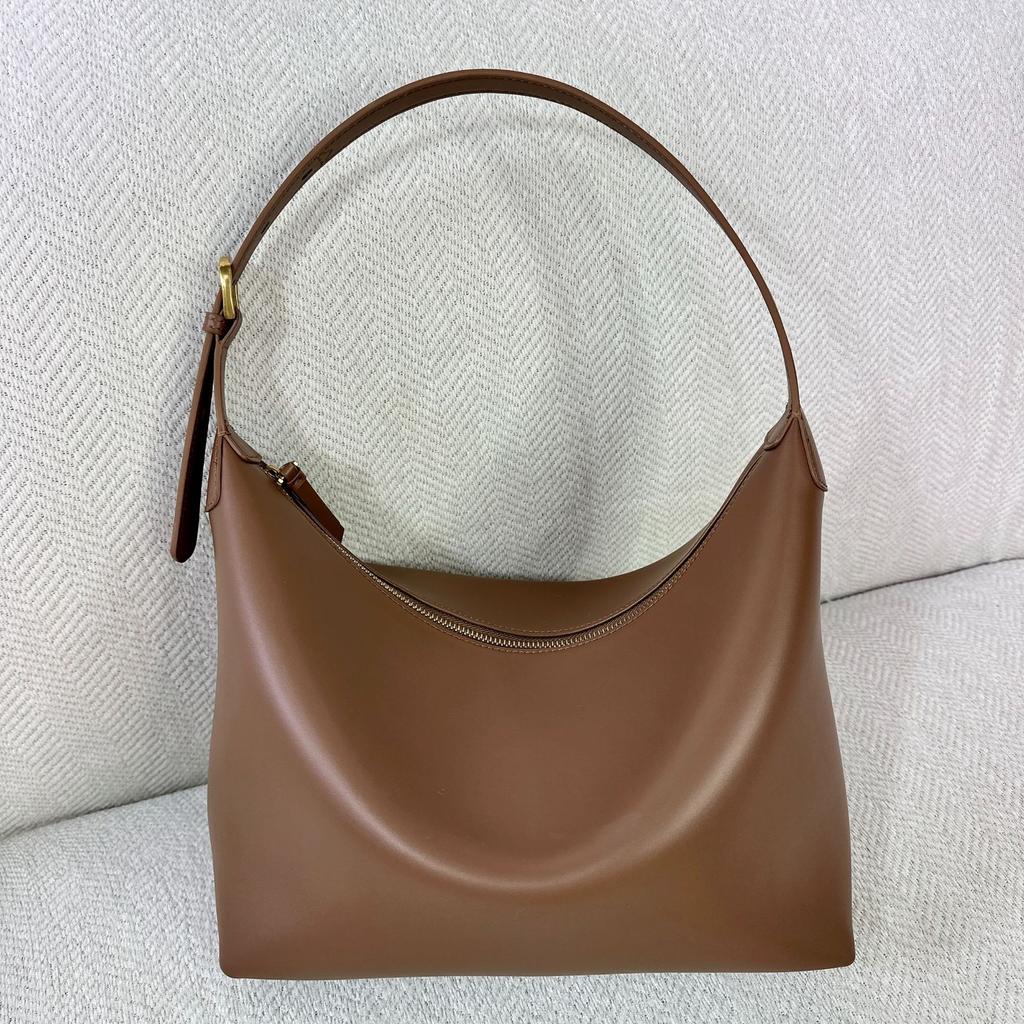 2025 Новая нишевая ретро кожаная сумка-хобо подмышкой Большая вместимость Модная сумка-тоут через плечо на одно плечо Тренд