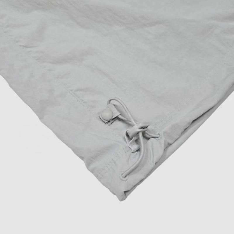 New Balance Унисекс Базовые нейлоновые брюки с логотипом Nbntc32703