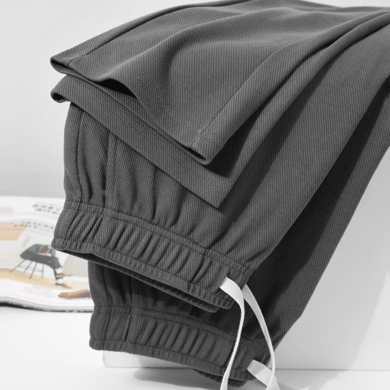 Корейский осенний молодежный тренд Мужские твиловые повседневные брюки Однотонные Эластичная талия Карман Кулиска Свободные Прямые Спортивные Универсальные Брюки