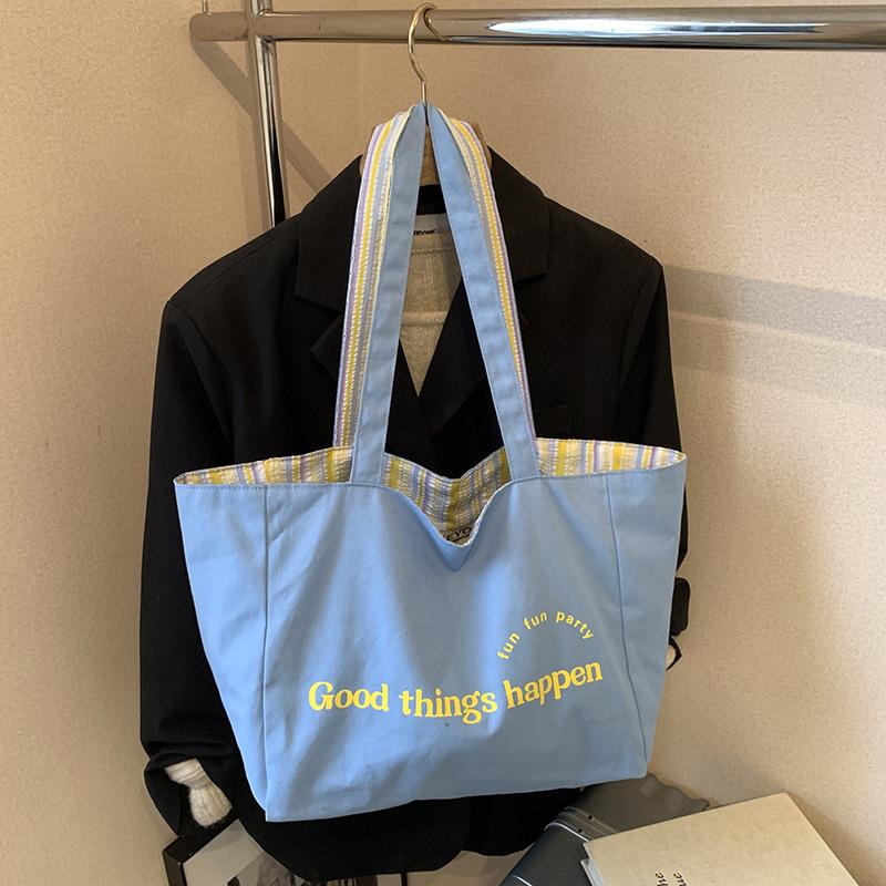 New Canvas Bag Lazy Wind Commuter Versatile Shoulder Bag Niche Casual Letter AB Face Tote Bag